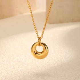Lune – Collana in acciaio con pendente dorato